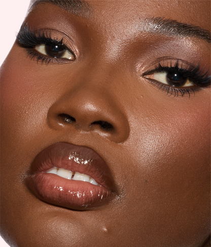FAUX FILLER Extra Shine Lip Gloss - RichCealer model wearing the product