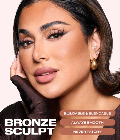 Huda Beauty founder Huda Kattan wearing Bronze Filter Palette bronzer, posing with a gloved hand on her cheek, text reading 'Bronze Sculpt', 'Buildable & blendable', 'Always smooth' and 'Never patchy'