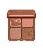 Huda Beauty Bronze Filter Palette in Light, open compact with four bronzer and contour shades on a white background