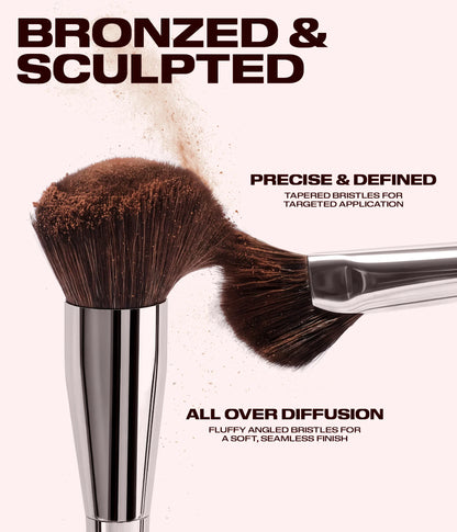 Huda Beauty Bronzer and Contour Brush close-up of the bristles with powder, text 'Bronzed and sculpted', 'Precise and defined' and 'All over diffusion'