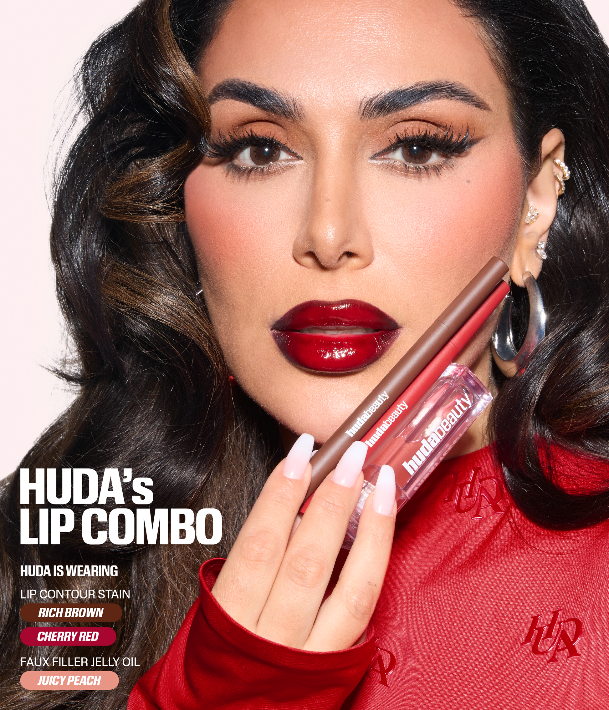 Huda wearing Rich Brown and Cherry Red Lip Contour Stains with Juicy Peach Faux Filler Jelly Oil.