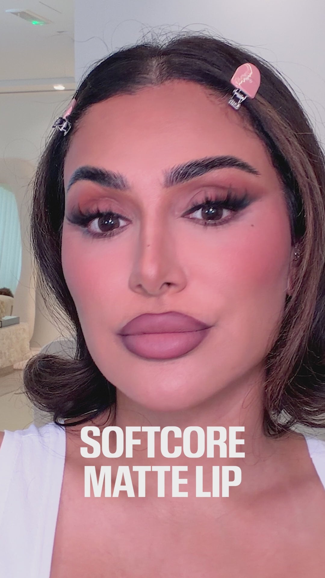 Huda trying Lip Contour Stain with Liquid Matte Mousse