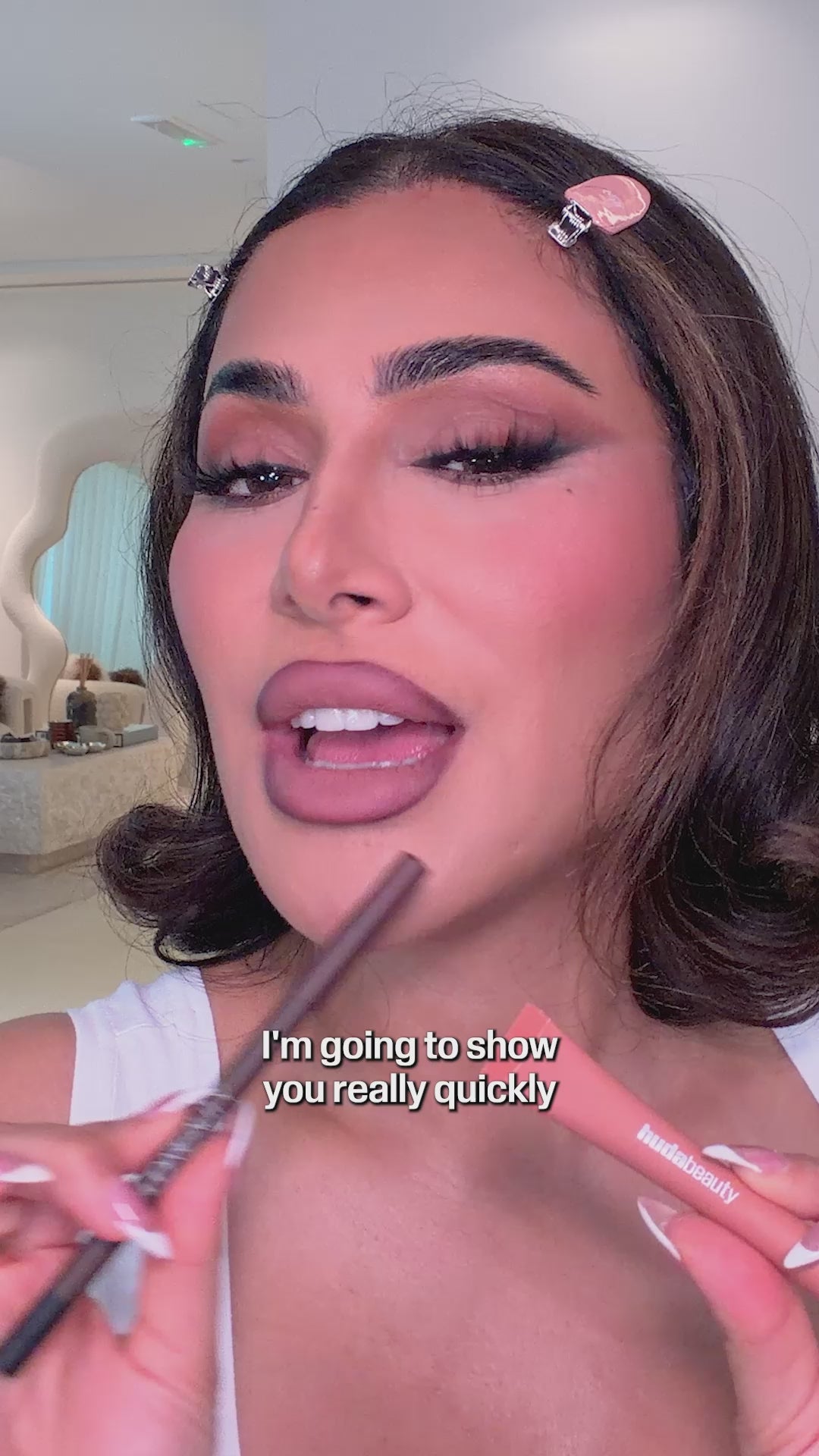 Huda trying Lip Contour Stain with Liquid Matte Mousse